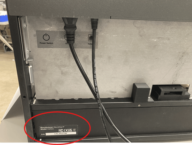back of printer with serial number circled